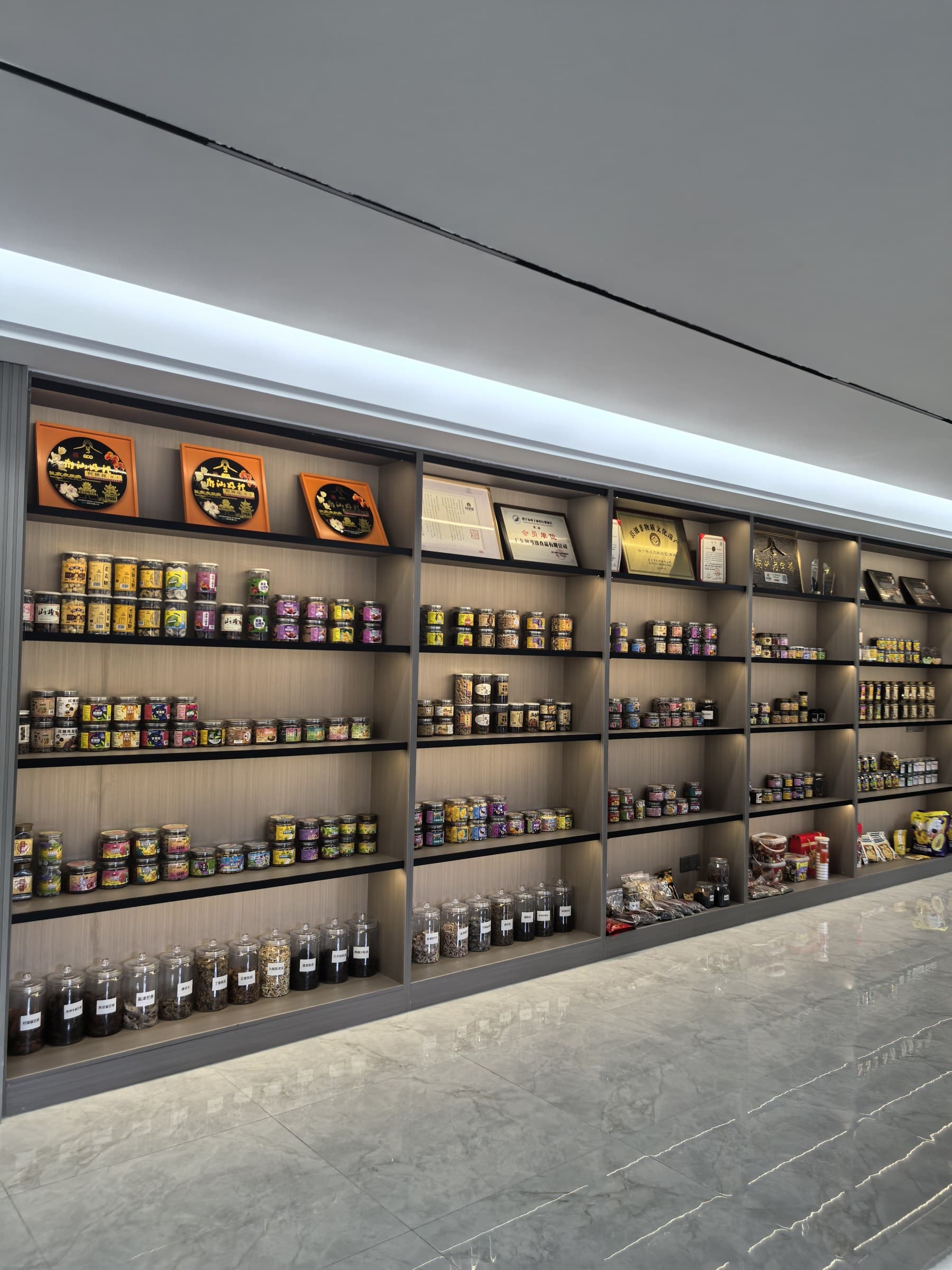 A SHAN SISTER product showroom displaying preserved fruit packaging